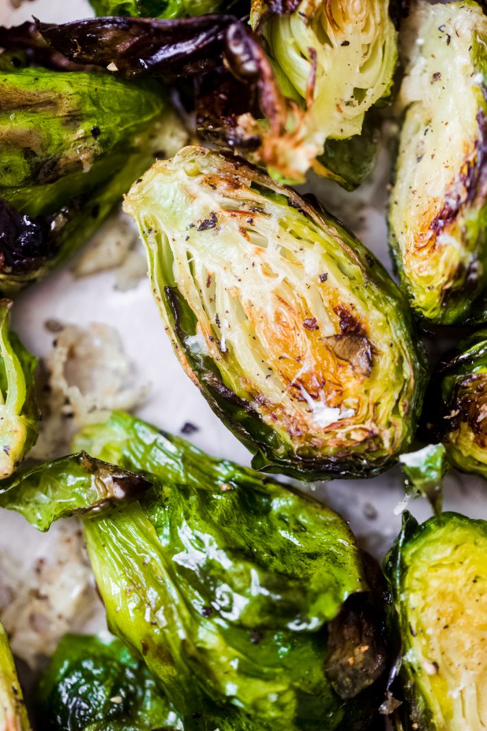 close up of roasted Brussels sprouts with pecorino cheese