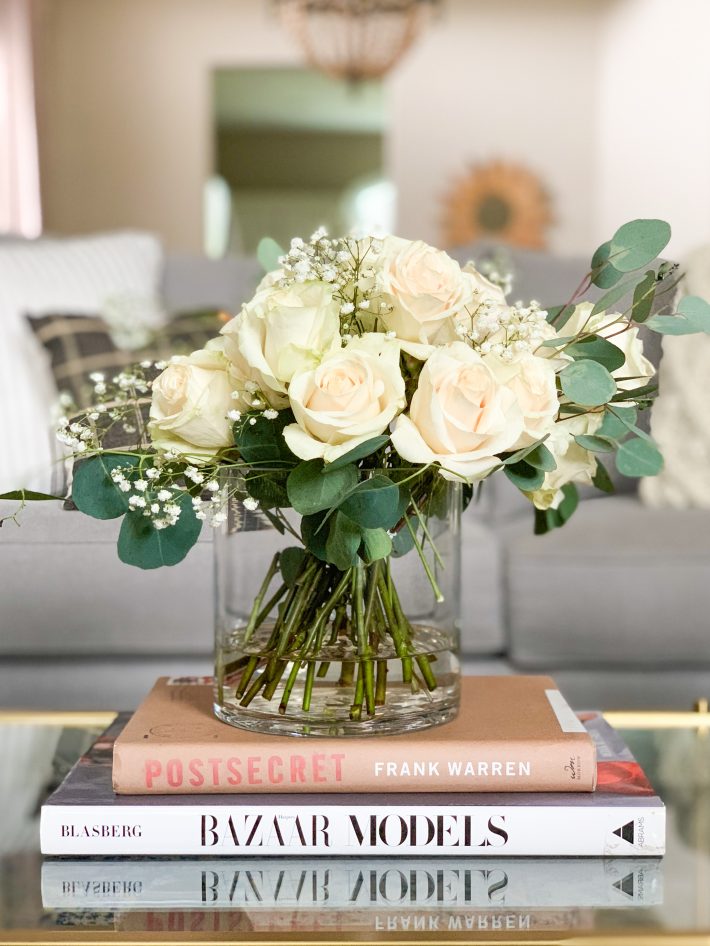 Stack of Books with Fresh Flowers