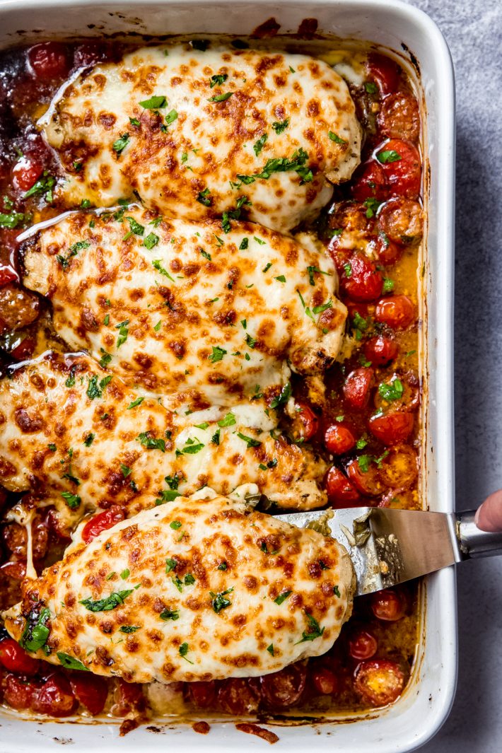 one pan chicken dinner with tomatoes and mozzarella